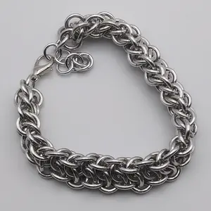 Bright silver aluminum chain mail bracelet on a white background.